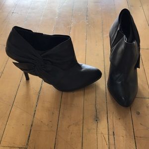Black leather bootie pumps
